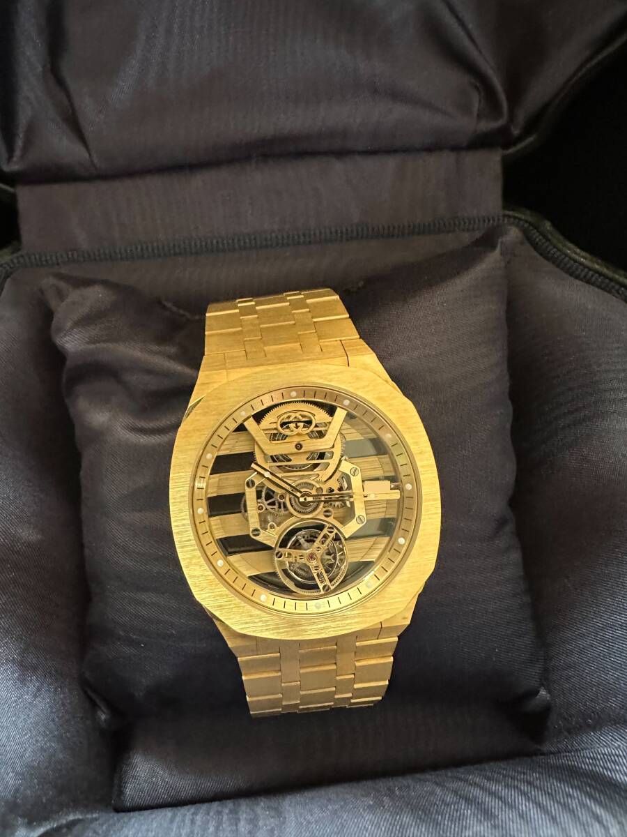 Gucci 25H Skeleton Flying Tourbillon · 18K Yellow Gold · Integrated Gold Bracelet · Cal. GG727.25.TS